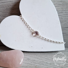 Load image into Gallery viewer, This stunning pink amethyst faceted cut stone is set in a Sterling Silver bracelet and is an elegant and eye catching piece
